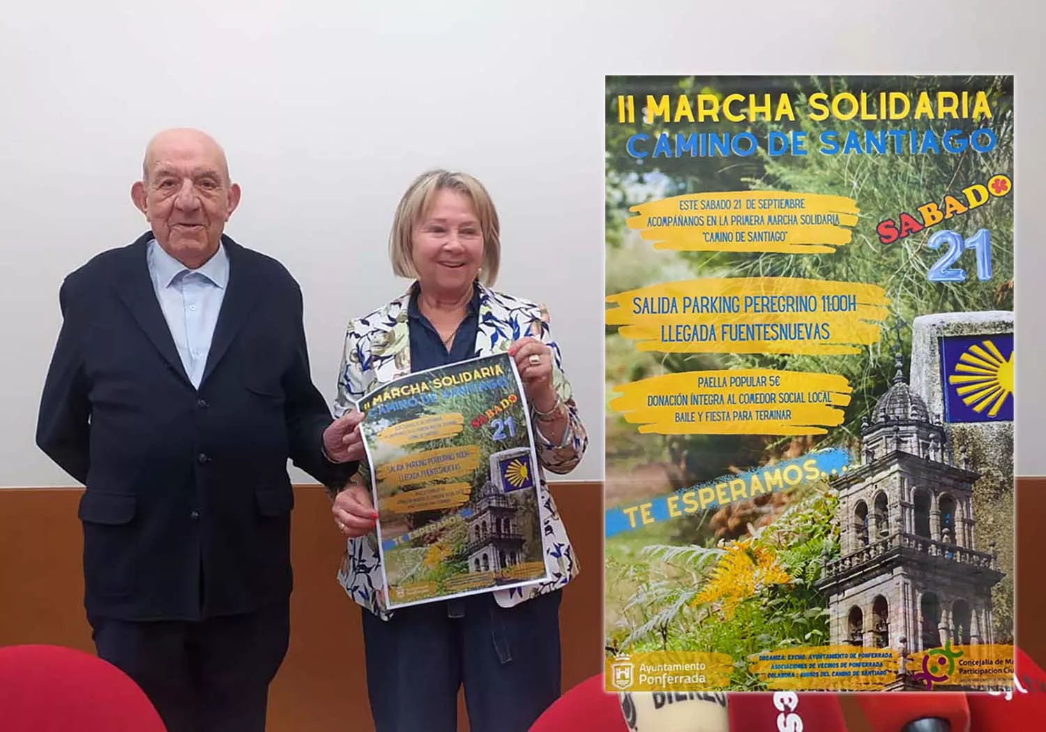 Mari Crespo, Concejala de Mayores y Participación Ciudadana, junto a Fernando Fra, administrador del Hogar del Transeúnte y Cartel de la II Marcha Solidaria Camino de Santiago